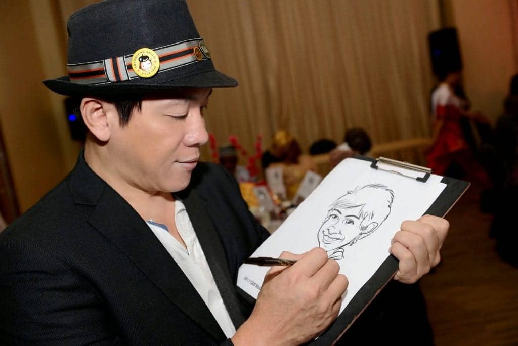 Party Entertainer - Caricaturist doing caricature in singapore