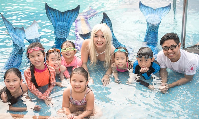 mermaid pool party hosting with mermaid and facilitator